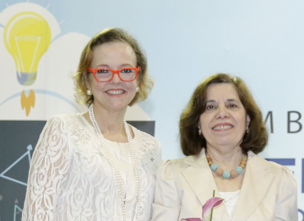 Ms. Gretchen B. Guzmán & Dr. Emma Fernandez-Repollet Ms. Gretchen B. Guzmán & Dr. Emma Fernandez-Repollet