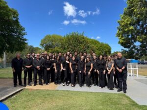 Banda de la Universidad de Puerto Rico en Aguadilla junto a su Director el Prof. Ángel L. Pacheco Valedón.